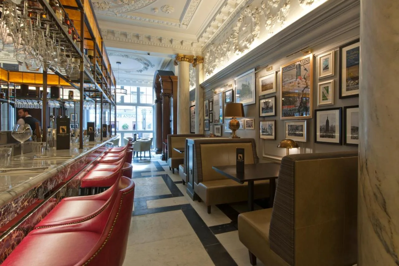 Grand bar with red booths